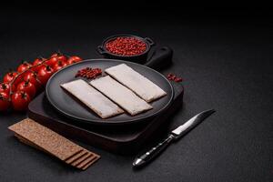 Rectangular whole grain crisp bread with cream cheese photo