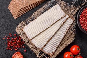 Rectangular whole grain crisp bread with cream cheese photo
