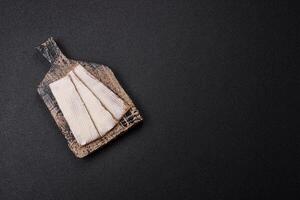 Rectangular whole grain crisp bread with cream cheese photo