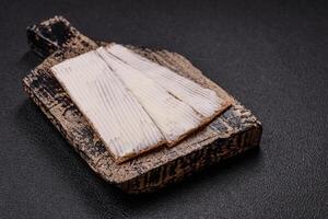 Rectangular whole grain crisp bread with cream cheese photo