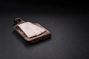 Rectangular whole grain crisp bread with cream cheese photo