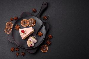 Piece of sweet cake with pink cream with raspberry flavor, with shortbread, cheesecake photo