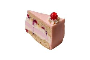 Piece of sweet cake with pink cream with raspberry flavor, with shortbread, cheesecake photo
