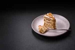 Layered sweet cake with cream, pear and dorblu cheese photo