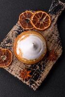 Sweet lemon tart with cream filling and zest photo