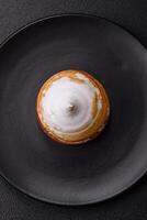 Sweet lemon tart with cream filling and zest photo