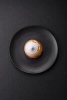 Sweet lemon tart with cream filling and zest photo