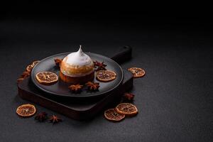 Sweet lemon tart with cream filling and zest photo
