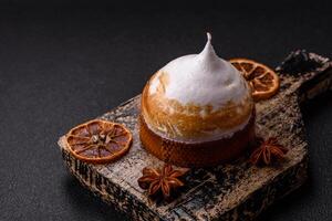 Sweet lemon tart with cream filling and zest photo