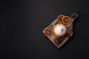 Sweet lemon tart with cream filling and zest photo