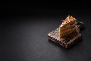 Layered sweet cake with cream, pear and dorblu cheese photo