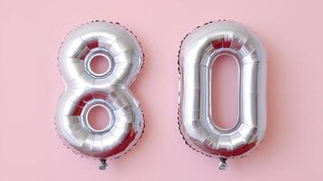 Silver chrome number 8 balloon with minimal background, modern birthday setup with a sleek, polished look photo