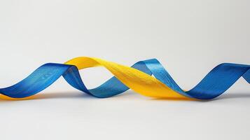A single yellow and blue ribbon elegantly intertwined, symbolizing the colors of the Ukrainian flag photo