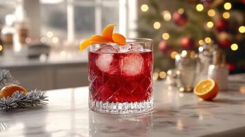 Vibrant Negroni Cocktail in Elegant Crystal Glass with Orange Garnish on Festive Holiday Table photo