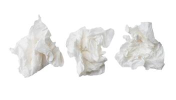 Top view set of screwed or crumpled white tissue paper ball isolated on white background with clipping path photo