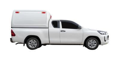 Side view of white delivery pickup truck with cab isolated on white background with clipping path photo