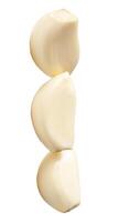 Top view of peeled garlic cloves in stack isolated on white background with clipping path photo