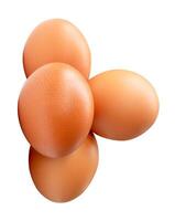 Top view of four brown chicken eggs in stack isolated on white background with clipping path photo