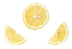 Top view set of fresh yellow lemon fruit in halves and slices or quarter scattering isolated on white background with clipping path photo