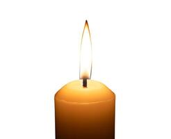 A single burning candle flame or light glowing on a big white candle isolated on white background with clipping path photo