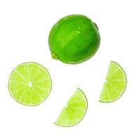 Top view set of fresh green lemon fruit with half and slices or quarters isolated on white background with clipping path photo