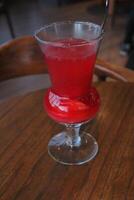 Non-Alcoholic Fresh cocktail on brown table with lemon fruit. fresh drink at the summer outside cofe shop photo