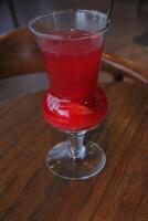 Non-Alcoholic Fresh cocktail on brown table with lemon fruit. fresh drink at the summer outside cofe shop photo