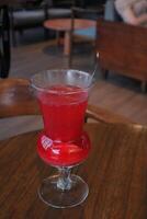 Non-Alcoholic Fresh cocktail on brown table with lemon fruit. fresh drink at the summer outside cofe shop photo