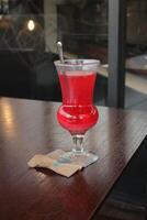 Non-Alcoholic Fresh cocktail on brown table with lemon fruit. fresh drink at the summer outside cofe shop photo