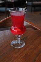 Non-Alcoholic Fresh cocktail on brown table with lemon fruit. fresh drink at the summer outside cofe shop photo