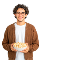 Young Man Enjoying Bowl of Popcorn with a Smile png