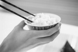 Delicious Rice Dish Served with Elegant Tableware and Ingredients photo