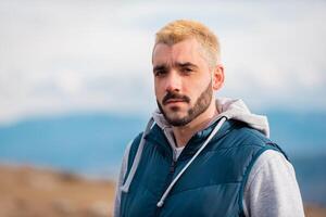 Portrait Of Young Handsome Man Outdoor. photo