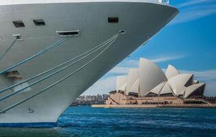 Front of large ship docked with Sydney Opera House in the background photo