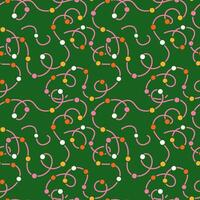 Seamless pattern with a flat-style Christmas garland in pink and orange colors with a green background. vector
