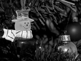 Christmas Tree with Red Ornaments and Lights photo