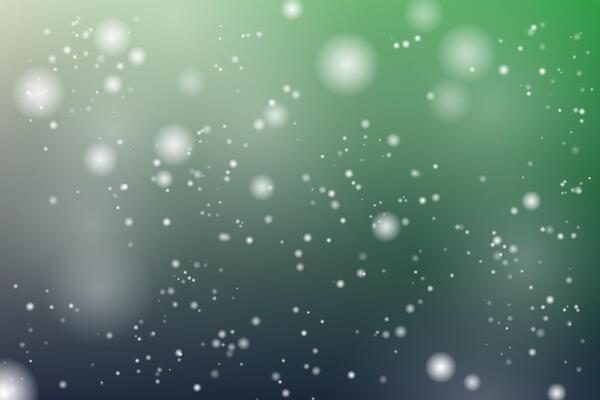 Abstract blue and green background. Glowing particles.