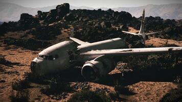 Plane wreckage displayed in a rocky landscape after a catastrophic crash event video