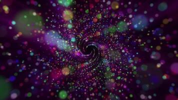 Magical particle background with a spiral of glowing colorful particles or orbs flowing towards the camera. This festive celebration party background is full HD and looping. video