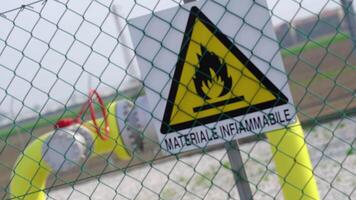 Big gas pipelines behind the flammable material sign video