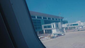 Airplane Window View of Airport Terminal video