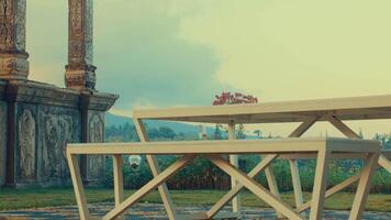 Tranquil Outdoor Scene with Wooden Table and Pillars video