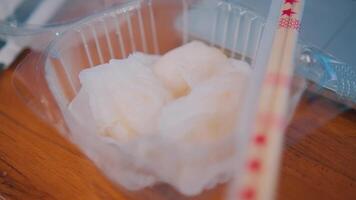 Shrimp Dumplings in a Container with Chopsticks video