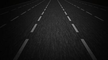 Motion above empty roadway with white markings on wide lanes video