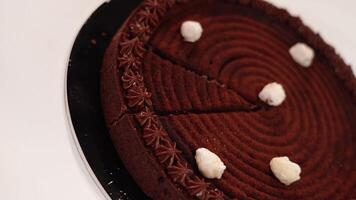Tray with tasty tart with filling and whipped cream on table video