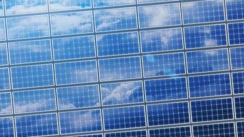 Large set of solar panels with reflected blue sky and clouds video