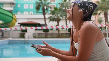 A Serene and Relaxing Moment by the Poolside with Soothing Music Drowning Out Distractions video