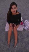 Enjoy a Chic Beachside Evening while Sipping on a Refreshing Drink to Unwind and Relax video