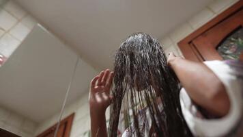 Explore a Hair Care Routine that Emphasizes Natural Techniques in a Relaxing Setting video