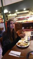 Savoring a delicious meal within a cozy and inviting restaurant environment is wonderful video